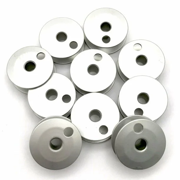 10 Pack Aluminum Bobbins - Brother #155484001 | GoldStar Tool 1 10 Pack Aluminum Bobbins - Brother #155484001 | GoldStar Tool